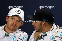 (L to R): Nico Rosberg (GER) Mercedes AMG F1 with team mate Lewis Hamilton (GBR) Mercedes AMG F1 in the FIA Press Conference. 14.03.2015. Formula 1 World Championship, Rd 1, Australian Grand Prix, Albert Park, Melbourne, Australia, Qualifying Day.
