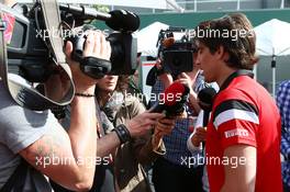 Roberto Merhi (ESP) Manor F1 Team with the media. 12.03.2015. Formula 1 World Championship, Rd 1, Australian Grand Prix, Albert Park, Melbourne, Australia, Preparation Day.