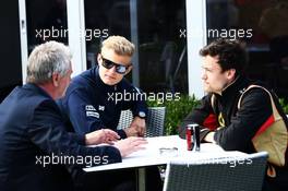 Marcus Ericsson (SWE) Sauber F1 Team (Centre) with Jolyon Palmer (GBR) Lotus F1 Team Test and Reserve Driver (Right). 12.03.2015. Formula 1 World Championship, Rd 1, Australian Grand Prix, Albert Park, Melbourne, Australia, Preparation Day.
