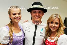 Nico Rosberg (GER) Mercedes AMG F1 with Formula Una girls. 19.06.2015. Formula 1 World Championship, Rd 8, Austrian Grand Prix, Spielberg, Austria, Practice Day.