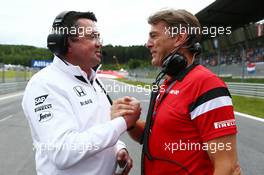 (L to R): Eric Boullier (FRA) McLaren Racing Director with Graeme Lowdon (GBR) Manor Marussia F1 Team Chief Executive Officer. 21.06.2015. Formula 1 World Championship, Rd 8, Austrian Grand Prix, Spielberg, Austria, Race Day.