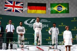 The podium (L to R): Lewis Hamilton (GBR) Mercedes AMG F1, second; Nico Rosberg (GER) Mercedes AMG F1, race winner; Felipe Massa (BRA) Williams, third.. 21.06.2015. Formula 1 World Championship, Rd 8, Austrian Grand Prix, Spielberg, Austria, Race Day.