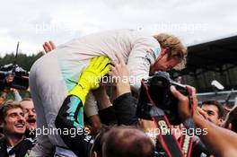 Race winner Nico Rosberg (GER) Mercedes AMG F1 celebrates with the team in parc ferme. 21.06.2015. Formula 1 World Championship, Rd 8, Austrian Grand Prix, Spielberg, Austria, Race Day.