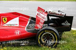 The damaged Ferrari SF15-T of race retiree Kimi Raikkonen (FIN) Ferrari. 21.06.2015. Formula 1 World Championship, Rd 8, Austrian Grand Prix, Spielberg, Austria, Race Day.