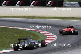 Roberto Merhi (ESP) Manor Marussia F1 Team leads Lewis Hamilton (GBR) Mercedes AMG F1 W06. 21.06.2015. Formula 1 World Championship, Rd 8, Austrian Grand Prix, Spielberg, Austria, Race Day.