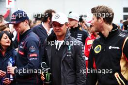 (L to R): Max Verstappen (NLD) Scuderia Toro Rosso with Nico Rosberg (GER) Mercedes AMG F1 and Romain Grosjean (FRA) Lotus F1 Team on the drivers parade. 21.06.2015. Formula 1 World Championship, Rd 8, Austrian Grand Prix, Spielberg, Austria, Race Day.