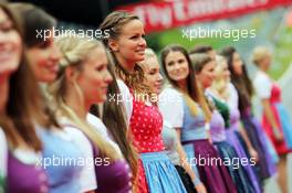 Formula Una girls on the drivers parade. 21.06.2015. Formula 1 World Championship, Rd 8, Austrian Grand Prix, Spielberg, Austria, Race Day.