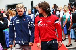 (L to R): Marcus Ericsson (SWE) Sauber F1 Team with Roberto Merhi (ESP) Manor Marussia F1 Team on the drivers parade. 21.06.2015. Formula 1 World Championship, Rd 8, Austrian Grand Prix, Spielberg, Austria, Race Day.