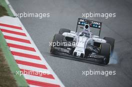 Valtteri Bottas (FIN) Williams FW37 locks up under braking. 21.02.2015. Formula One Testing, Day Three, Barcelona, Spain.