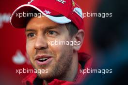 Sebastian Vettel (GER) Ferrari with the media. 21.02.2015. Formula One Testing, Day Three, Barcelona, Spain.
