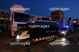 Police vehicles arrive in the paddock. 19.02.2015. Formula One Testing, Day One, Barcelona, Spain.
