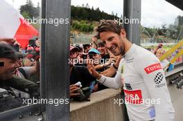 Romain Grosjean (FRA) Lotus F1 Team  celebrates his third position with the fans. 23.08.2015. Formula 1 World Championship, Rd 13, Belgian Grand Prix, Spa Francorchamps, Belgium, Race Day.