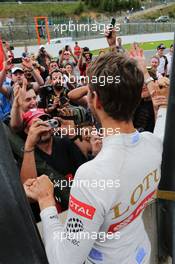 Romain Grosjean (FRA) Lotus F1 Team  celebrates his third position with the fans. 23.08.2015. Formula 1 World Championship, Rd 13, Belgian Grand Prix, Spa Francorchamps, Belgium, Race Day.