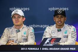 (L to R): Nico Rosberg (GER) Mercedes AMG F1 and team mate Lewis Hamilton (GBR) Mercedes AMG F1 in the FIA Press Conference. 23.08.2015. Formula 1 World Championship, Rd 13, Belgian Grand Prix, Spa Francorchamps, Belgium, Race Day.