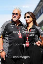 Dr. Vijay Mallya (IND) Sahara Force India F1 Team Owner with his partner Pinky Lalwani (IND). 23.08.2015. Formula 1 World Championship, Rd 13, Belgian Grand Prix, Spa Francorchamps, Belgium, Race Day.