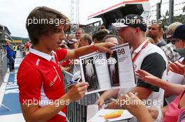 Roberto Merhi (ESP) Manor Marussia F1 Team signs autographs for the fans. 20.08.2015. Formula 1 World Championship, Rd 11, Belgian Grand Prix, Spa Francorchamps, Belgium, Preparation Day.