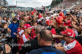 Sebastian Vettel (GER) Ferrari signs autographs for the fans. 20.08.2015. Formula 1 World Championship, Rd 11, Belgian Grand Prix, Spa Francorchamps, Belgium, Preparation Day.