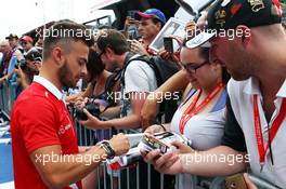 Will Stevens (GBR) Manor Marussia F1 Team signs autographs for the fans. 20.08.2015. Formula 1 World Championship, Rd 11, Belgian Grand Prix, Spa Francorchamps, Belgium, Preparation Day.