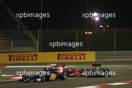 Sebastian Vettel (GER) Ferrari SF15-T has his front wing clipped by Sergio Perez (MEX) Sahara Force India F1 VJM08 with Felipe Nasr (BRA) Sauber C34 leading the pair. 17.04.2015. Formula 1 World Championship, Rd 4, Bahrain Grand Prix, Sakhir, Bahrain, Practice Day