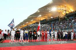 The drivers observe the national anthem at the front of the grid.. 19.04.2015. Formula 1 World Championship, Rd 4, Bahrain Grand Prix, Sakhir, Bahrain, Race Day.