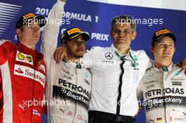 The podium (L to R): Kimi Raikkonen (FIN) Ferrari, second; Lewis Hamilton (GBR) Mercedes AMG F1, race winner; Nico Rosberg (GER) Mercedes AMG F1, third. 19.04.2015. Formula 1 World Championship, Rd 4, Bahrain Grand Prix, Sakhir, Bahrain, Race Day.