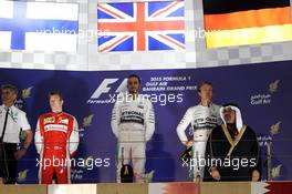 The podium (L to R): Kimi Raikkonen (FIN) Ferrari, second; Lewis Hamilton (GBR) Mercedes AMG F1, race winner; Nico Rosberg (GER) Mercedes AMG F1, third. 19.04.2015. Formula 1 World Championship, Rd 4, Bahrain Grand Prix, Sakhir, Bahrain, Race Day.
