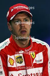Sebastian Vettel (GER) Ferrari in the FIA Press Conference. 18.04.2015. Formula 1 World Championship, Rd 4, Bahrain Grand Prix, Sakhir, Bahrain, Qualifying Day.