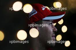 Sebastian Vettel (GER) Ferrari with the media. 18.04.2015. Formula 1 World Championship, Rd 4, Bahrain Grand Prix, Sakhir, Bahrain, Qualifying Day.