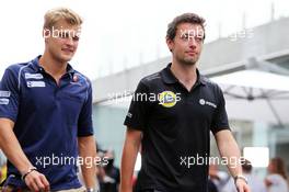 (L to R): Marcus Ericsson (SWE) Sauber F1 Team with Jolyon Palmer (GBR) Lotus F1 Team Test and Reserve Driver. 13.11.2015. Formula 1 World Championship, Rd 18, Brazilian Grand Prix, Sao Paulo, Brazil, Practice Day.