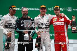 1st place Nico Rosberg (GER) Mercedes AMG F1 W06, 2nd place Lewis Hamilton (GBR) Mercedes AMG F1 and 3rd place Sebastian Vettel (GER) Ferrari SF15-T. 15.11.2015. Formula 1 World Championship, Rd 18, Brazilian Grand Prix, Sao Paulo, Brazil, Race Day.