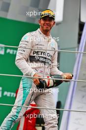 Lewis Hamilton (GBR) Mercedes AMG F1 celebrates his second position on the podium. 15.11.2015. Formula 1 World Championship, Rd 18, Brazilian Grand Prix, Sao Paulo, Brazil, Race Day.