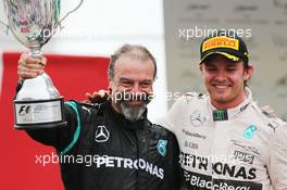 The podium (L to R): James Wade (GBR) Darts Player celebrates with race winner Nico Rosberg (GER) Mercedes AMG F1. 15.11.2015. Formula 1 World Championship, Rd 18, Brazilian Grand Prix, Sao Paulo, Brazil, Race Day.