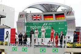 The podium (L to R): Lewis Hamilton (GBR) Mercedes AMG F1, second; Nico Rosberg (GER) Mercedes AMG F1, race winner; Sebastian Vettel (GER) Ferrari, third. 15.11.2015. Formula 1 World Championship, Rd 18, Brazilian Grand Prix, Sao Paulo, Brazil, Race Day.