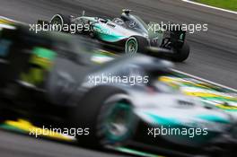 Nico Rosberg (GER) Mercedes AMG F1 W06 leads team mate Lewis Hamilton (GBR) Mercedes AMG F1 W06. 15.11.2015. Formula 1 World Championship, Rd 18, Brazilian Grand Prix, Sao Paulo, Brazil, Race Day.