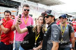 Sergio Perez (MEX) Sahara Force India F1 with fans. 15.11.2015. Formula 1 World Championship, Rd 18, Brazilian Grand Prix, Sao Paulo, Brazil, Race Day.