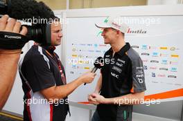 Nico Hulkenberg (GER) Sahara Force India F1 with Ted Kravitz (GBR) Sky Sports Pitlane Reporter. 12.11.2015. Formula 1 World Championship, Rd 18, Brazilian Grand Prix, Sao Paulo, Brazil, Preparation Day.