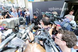 Lewis Hamilton (GBR) Mercedes AMG F1 with the media. 12.11.2015. Formula 1 World Championship, Rd 18, Brazilian Grand Prix, Sao Paulo, Brazil, Preparation Day.