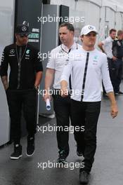 (L to R): Lewis Hamilton (GBR) Mercedes AMG F1 with Ron Meadows (GBR) Mercedes GP Team Manager and Nico Rosberg (GER) Mercedes AMG F1. 05.06.2015. Formula 1 World Championship, Rd 7, Canadian Grand Prix, Montreal, Canada, Practice Day.