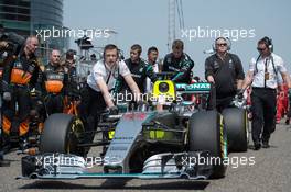 Lewis Hamilton (GBR) Mercedes AMG F1 W06 on the grid. 12.04.2015. Formula 1 World Championship, Rd 3, Chinese Grand Prix, Shanghai, China, Race Day.