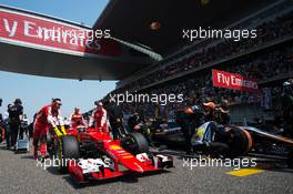 Kimi Raikkonen (FIN) Ferrari SF15-T on the grid. 12.04.2015. Formula 1 World Championship, Rd 3, Chinese Grand Prix, Shanghai, China, Race Day.