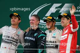 Nico Rosberg (GER), Mercedes AMG F1 Team, Lewis Hamilton (GBR), Mercedes AMG F1 Team and Sebastian Vettel (GER), Scuderia Ferrari  12.04.2015. Formula 1 World Championship, Rd 3, Chinese Grand Prix, Shanghai, China, Race Day.