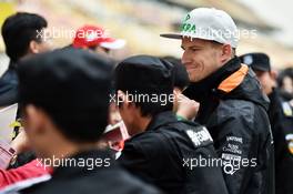 Nico Hulkenberg (GER) Sahara Force India F1 signs autographs for the fans. 09.04.2015. Formula 1 World Championship, Rd 3, Chinese Grand Prix, Shanghai, China, Preparation Day.