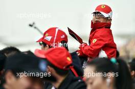 A young Ferrari fan. 09.04.2015. Formula 1 World Championship, Rd 3, Chinese Grand Prix, Shanghai, China, Preparation Day.