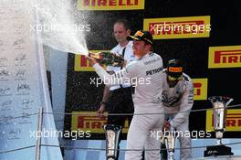 Race winner Nico Rosberg (GER) Mercedes AMG F1 celebrates with the champagne on the podium. 10.05.2015. Formula 1 World Championship, Rd 5, Spanish Grand Prix, Barcelona, Spain, Race Day.