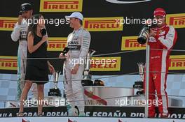 Maria Serrat (ESP) Telefonica TV Presenter interviews race winner Nico Rosberg (GER) Mercedes AMG F1 on the podium. 10.05.2015. Formula 1 World Championship, Rd 5, Spanish Grand Prix, Barcelona, Spain, Race Day.