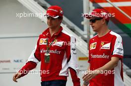 (L to R): Esteban Gutierrez (MEX) Ferrari Test and Reserve Driver with Kimi Raikkonen (FIN) Ferrari. 03.07.2015. Formula 1 World Championship, Rd 9, British Grand Prix, Silverstone, England, Practice Day.