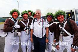 Pat Symonds (GBR) Williams Chief Technical Officer with Oompa Loompa fans. 03.07.2015. Formula 1 World Championship, Rd 9, British Grand Prix, Silverstone, England, Practice Day.