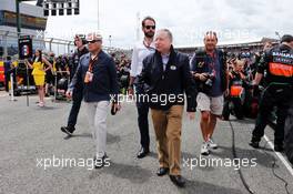 Jean Todt (FRA) FIA President with Sir Martin Sorrell (GBR) WPP CEO on the grid. 05.07.2015. Formula 1 World Championship, Rd 9, British Grand Prix, Silverstone, England, Race Day.