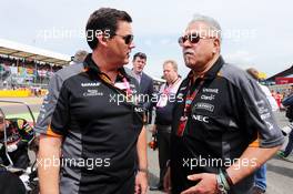 (L to R): Steve Curnow (GBR) Sahara Force India F1 Team Commercial Director with Dr. Vijay Mallya (IND) Sahara Force India F1 Team Owner on the grid. 05.07.2015. Formula 1 World Championship, Rd 9, British Grand Prix, Silverstone, England, Race Day.