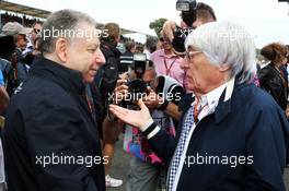 (L to R): Jean Todt (FRA) FIA President with Bernie Ecclestone (GBR) on the grid. 05.07.2015. Formula 1 World Championship, Rd 9, British Grand Prix, Silverstone, England, Race Day.